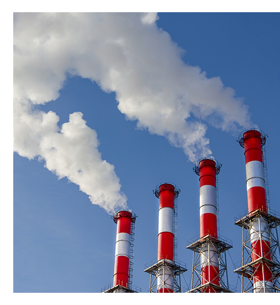 大いなる目標と展開 工場の円筒からの煙のイメージ画像